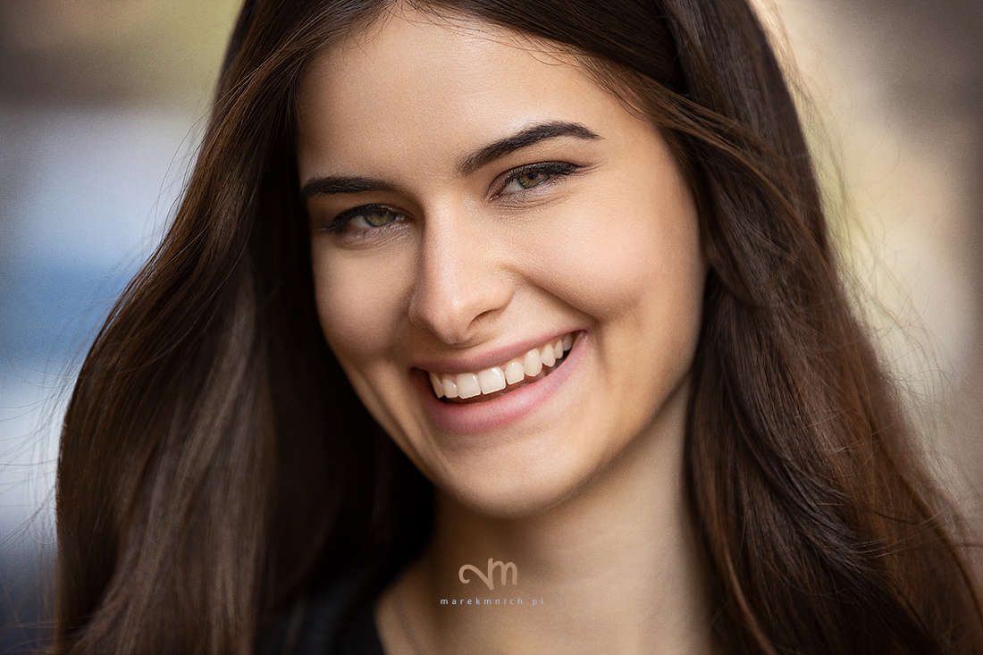 Portrait of cute happy beautiful young brunette girl